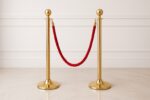 Gold Stanchion Post with Red Rope